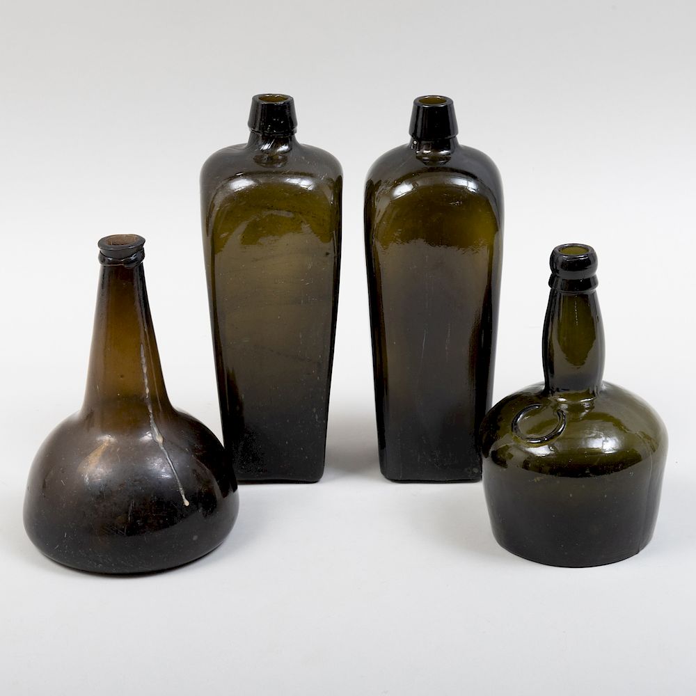 Appraisal: Group of Four Glass Gin Bottles Comprising Two square bottles