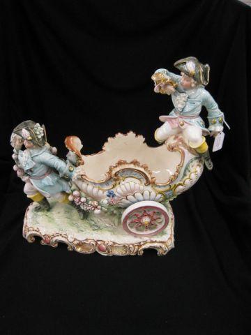 Appraisal: European Majolica Figural Centerpiece children soldier and chariot tall long