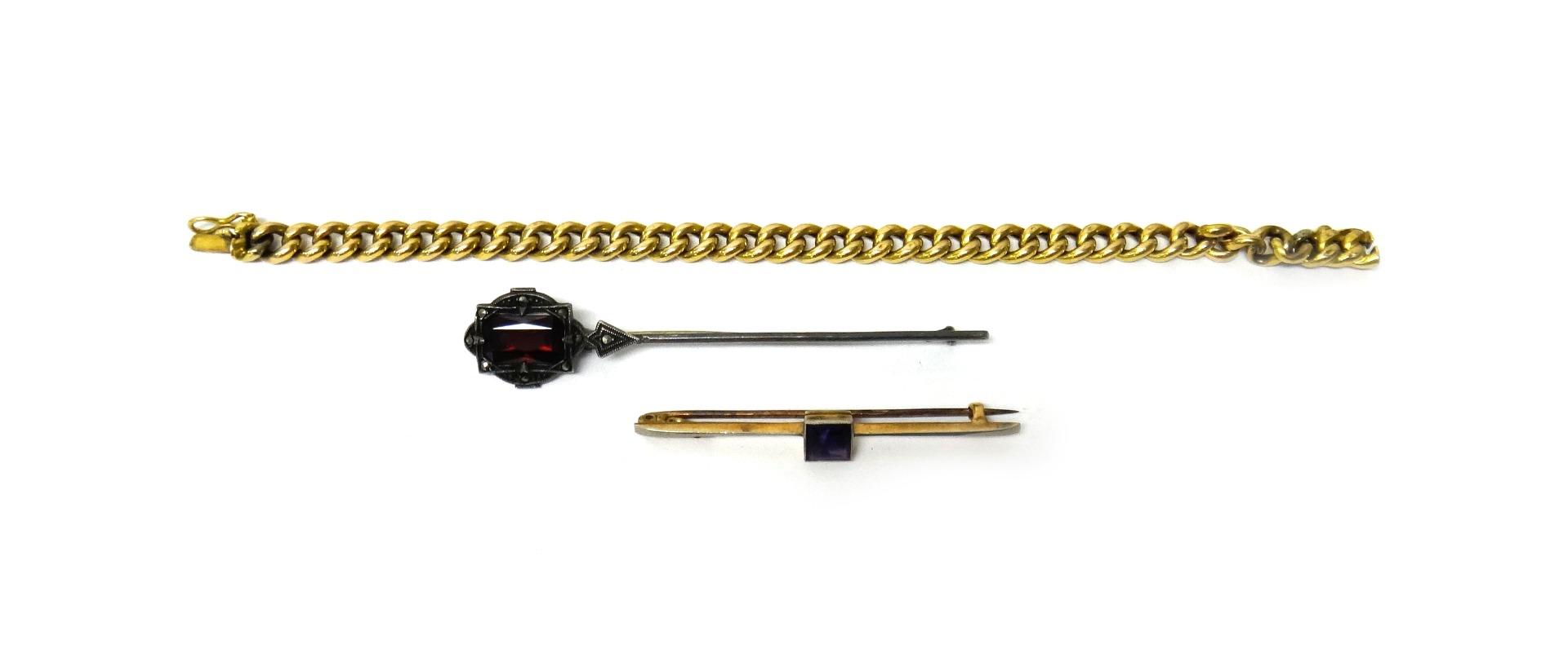 Appraisal: A gold curb link bracelet on a snap clasp length