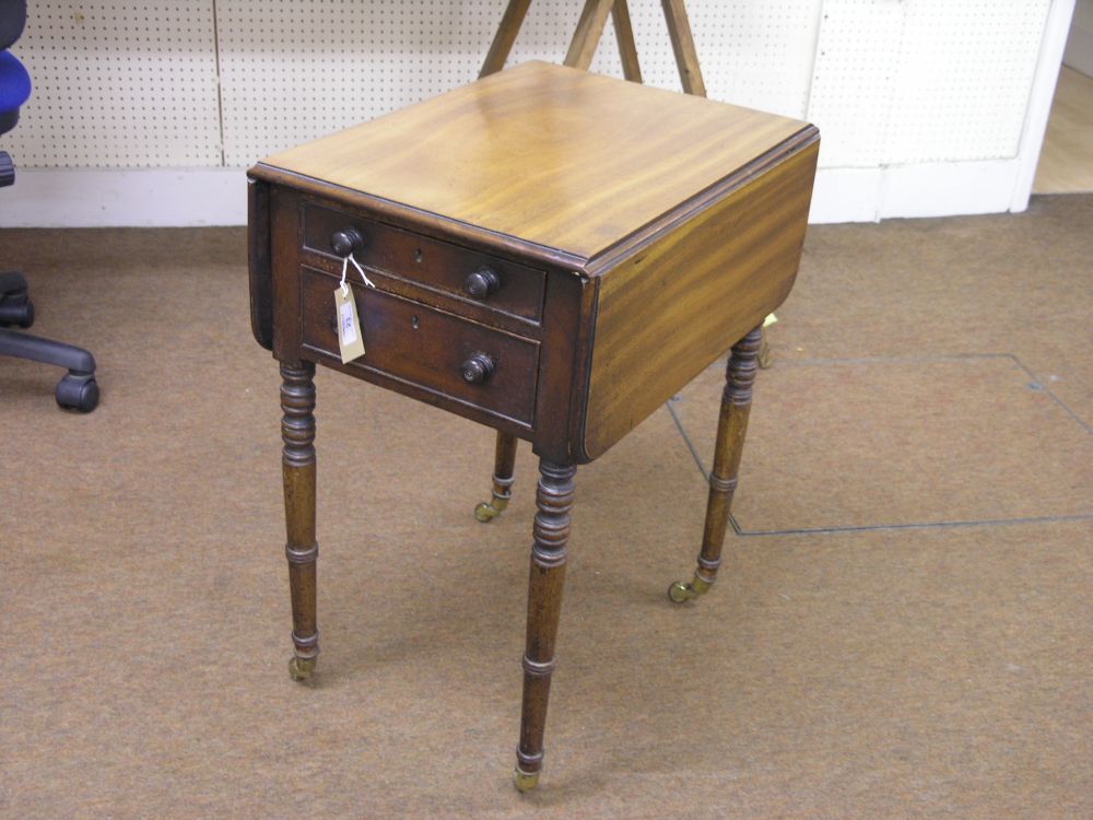 Appraisal: An early Victorian mahogany drop-leaf work table with two frieze