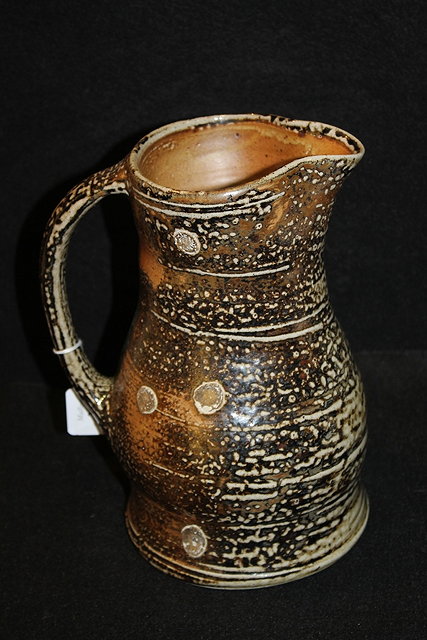 Appraisal: A MICKI SHLOESSINGK STUDIO POTTERY SALT GLAZED JUG impressed potter's