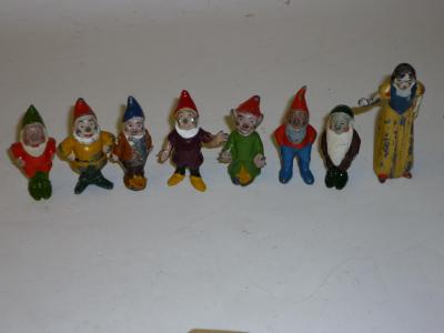 Appraisal: A metal set Snow White and the Seven Dwarfs high