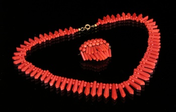 Appraisal: A Vintage Italian Carved Coral Necklace and Brooch The necklace