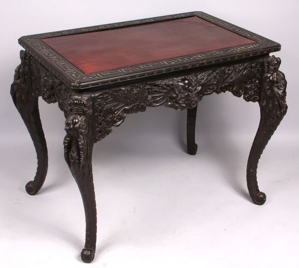 Appraisal: th Century heavily carved Chinese table h x w x