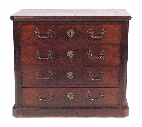 Appraisal: A mahogany chest with four long drawers on a plinth