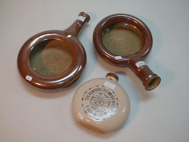 Appraisal: Two thC salt glazed bedpans and a earthenware hot water