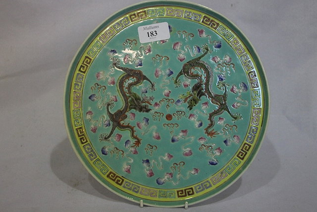 Appraisal: A CHINESE PORCELAIN CIRCULAR TRAY painted with two dragons fighting