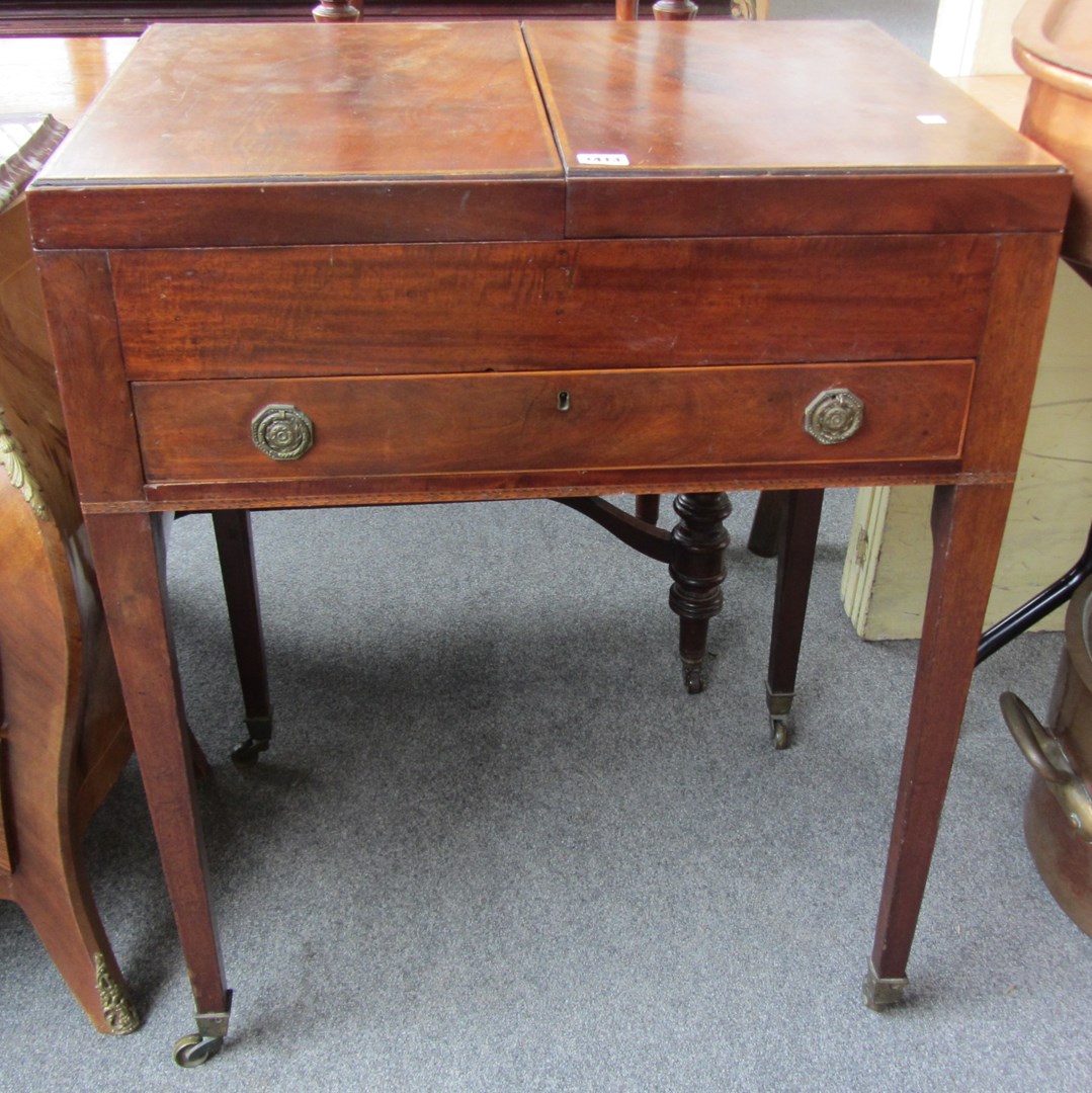 Appraisal: A George III inlaid mahogany lift top dressing table with