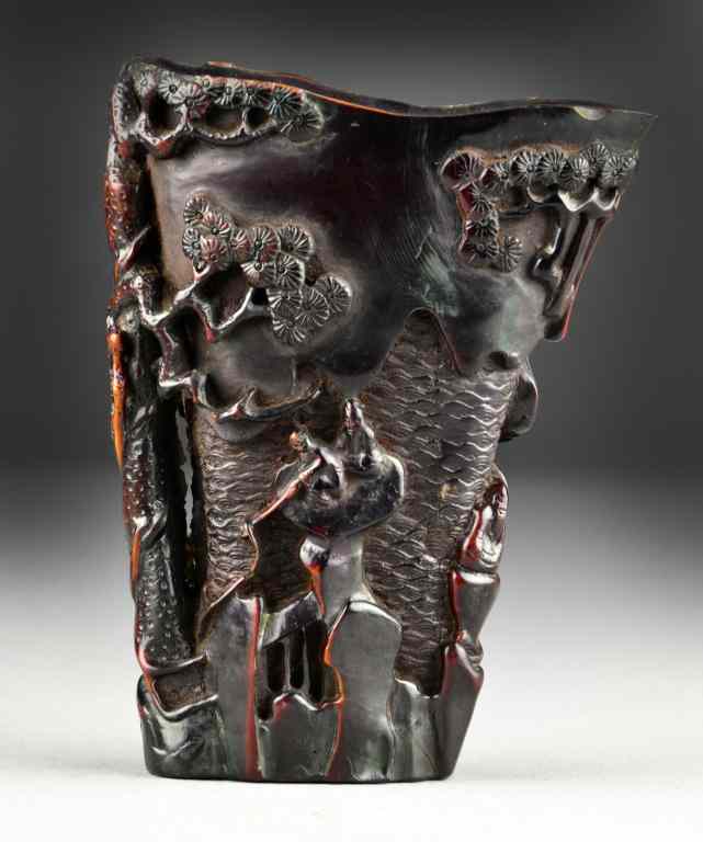 Appraisal: Chinese Carved Horn Libation CupFinely carved to depict figures within