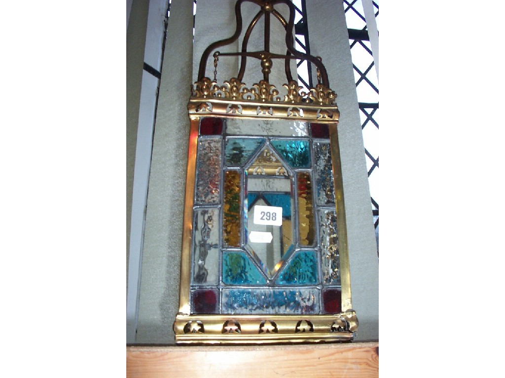 Appraisal: A late th century -sided hall lantern with coloured leaded