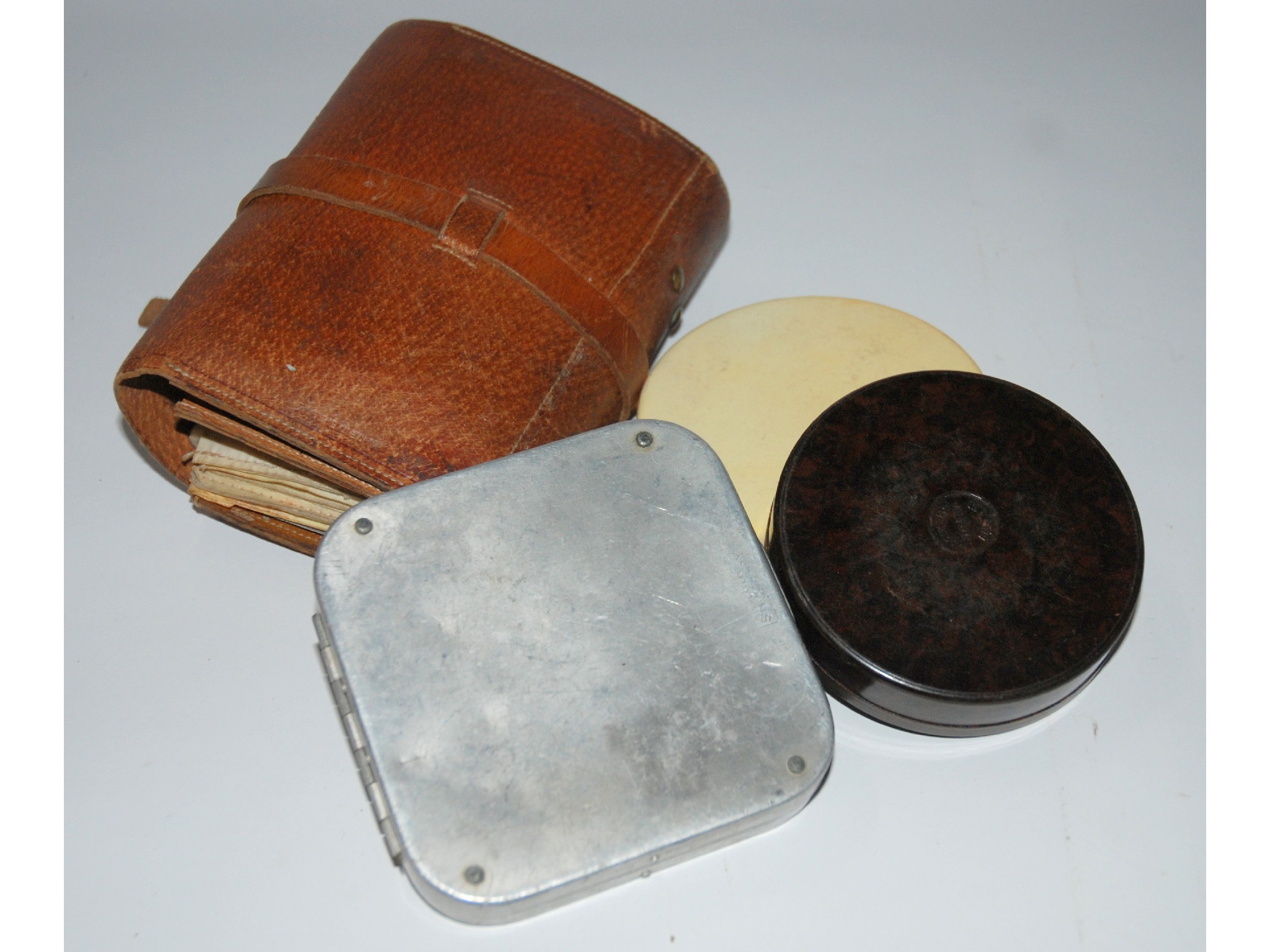 Appraisal: A Hardy Bros Bakelite circular fly case a Wheatley Silmalloy