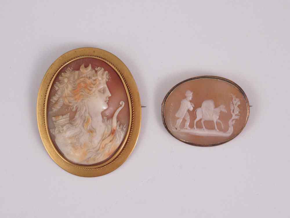 Appraisal: LARGE K CAMEO AND AN UNUSUAL DONKEY CAMEO K frame