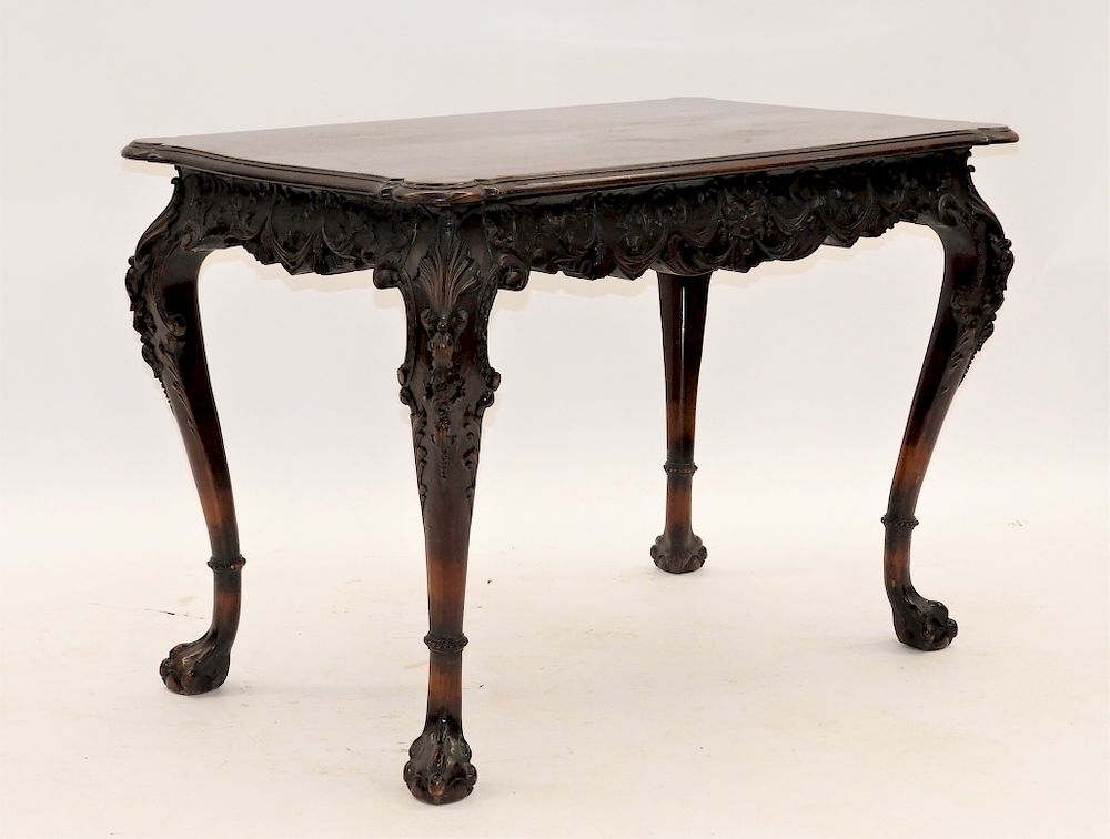 Appraisal: European Carved Walnut Rococo Library Table Europe th Century Scalloped