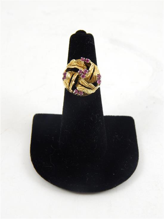 Appraisal: JEWELRY Lady's ruby cluster K yellow gold ring open textured