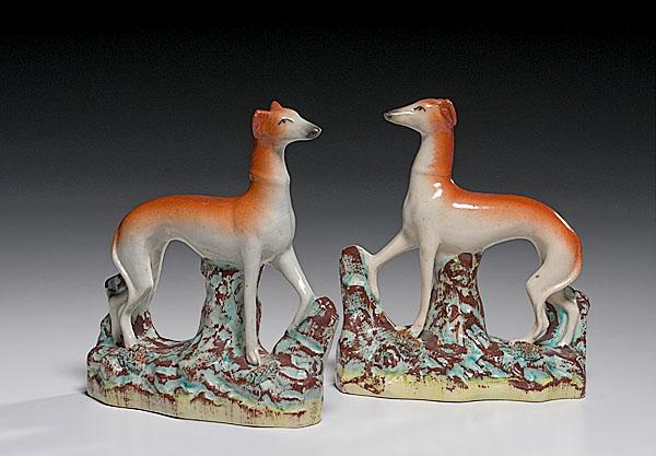 Appraisal: PAIR OF STAFFORDSHIRE WHIPPET MANTEL ORNAMENTS British mid- th century