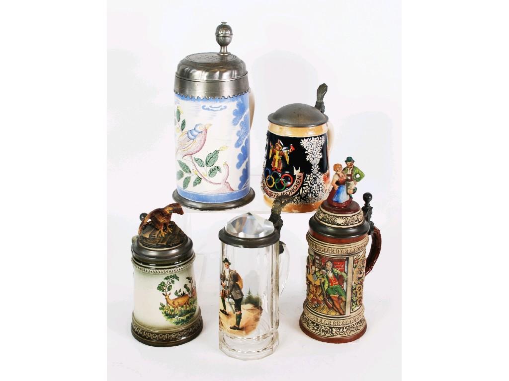 Appraisal: EIGHT VARIOUS POTTERY STEINS WITH COVERS including a limited edition