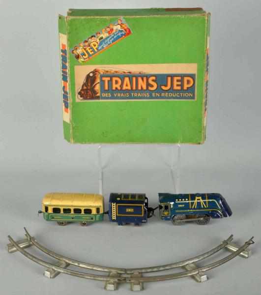 Appraisal: Tin Litho JEP Wind-Up Passenger Train Set Description French Engine