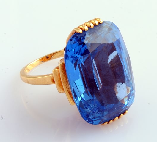 Appraisal: KY X mm Swiss blue antique cushion cut topaz Approx