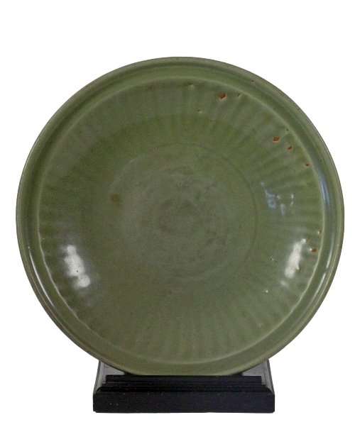 Appraisal: A Ming Dynasty celadon bowl th Century with fluted sides