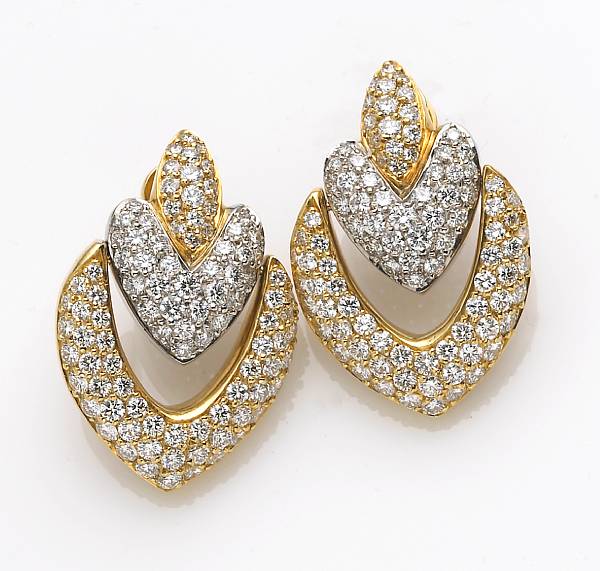 Appraisal: A pair of diamond and k bicolor gold doorknocker earrings