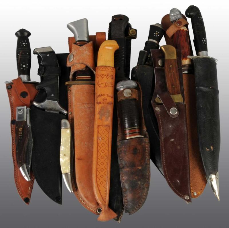 Appraisal: Lot of Hunting Knives Description Includes knives with leather sheaths