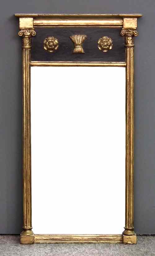 Appraisal: A late Georgian gilt framed pier glass with ebonised frieze