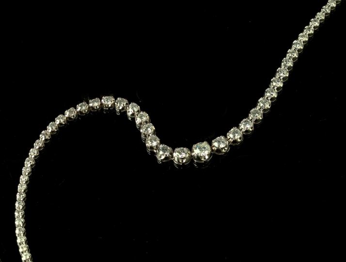 Appraisal: Fourteen-Karat White Gold and Diamond Necklace the graduated round brilliant