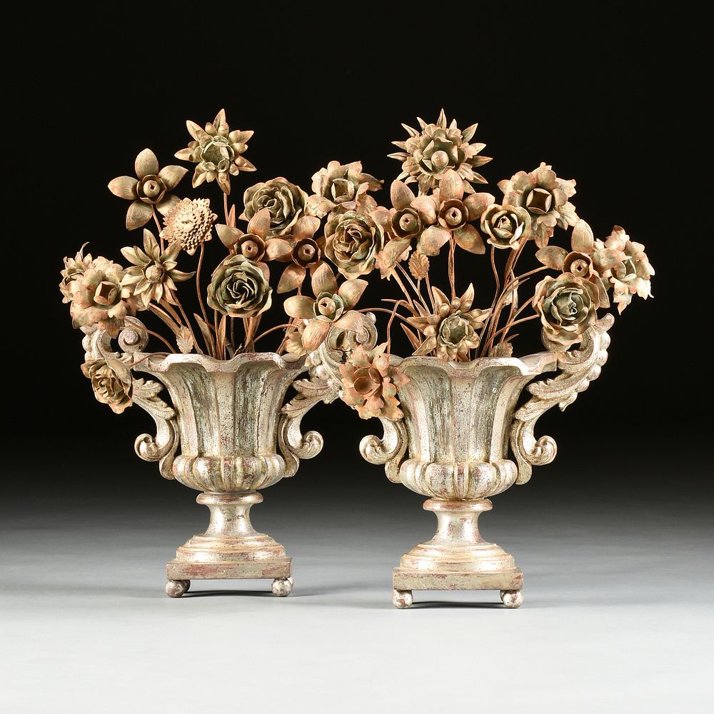 Appraisal: A PAIR OF ROCOCO STYLE SILVERED METAL FLOWER FILLED WOOD