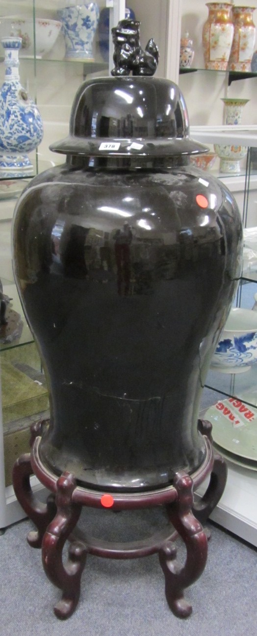 Appraisal: A large Chinese black glazed vase and cover th century