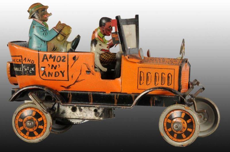 Appraisal: Marx Tin Wind-Up Amos N Andy Taxi Toy Description Wind-up