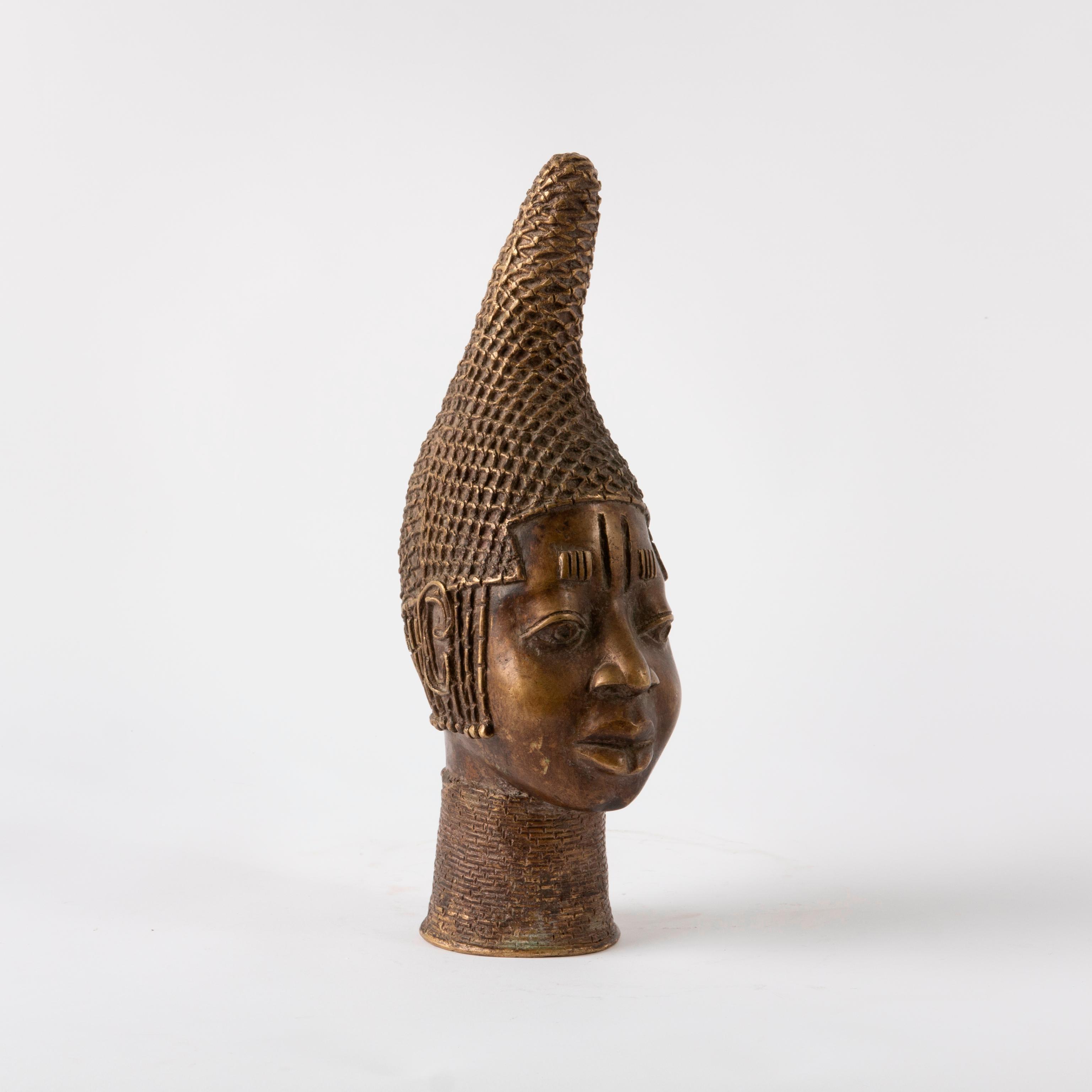 Appraisal: VINTAGE BRONZE HEAD OF IYOBA BENIN A vintage cast bronze