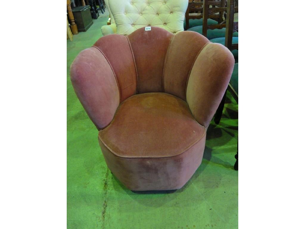 Appraisal: An Art Deco style tub chair with shell or fan