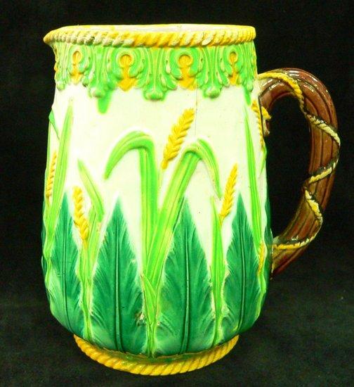 Appraisal: A Minton Majolica vase decorated wheat and foliage in low