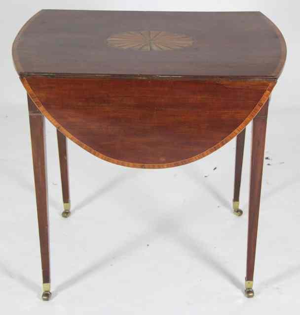 Appraisal: A George III mahogany fan inlaid Pembroke table with oval