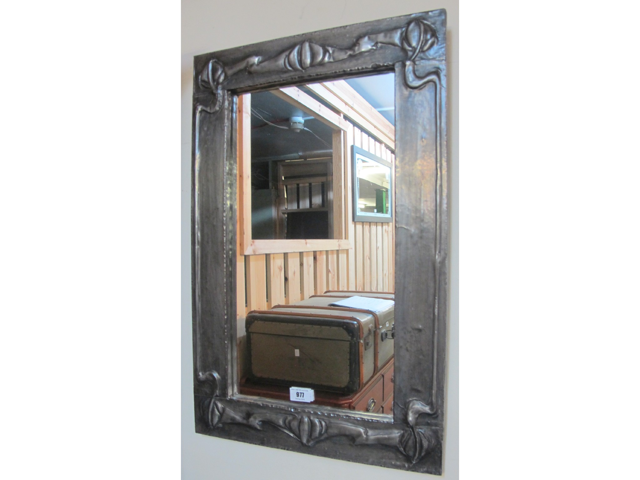 Appraisal: An Art Nouveau style lead wall mirror