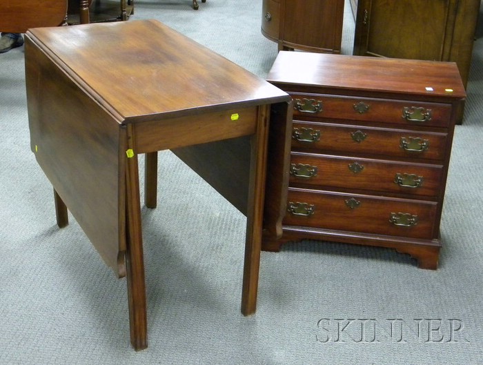 Appraisal: Chippendale-style Mahogany Drop-leaf Table and a Diminutive Chippendale-style Walnut Four-Drawer