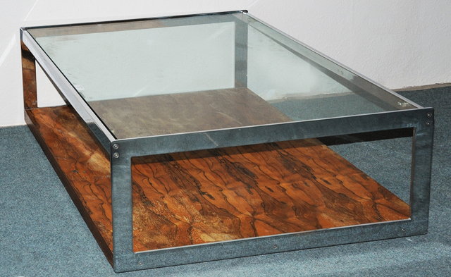 Appraisal: A MERROW ASSOCIATES COFFEE TABLE with chrome frame glass top