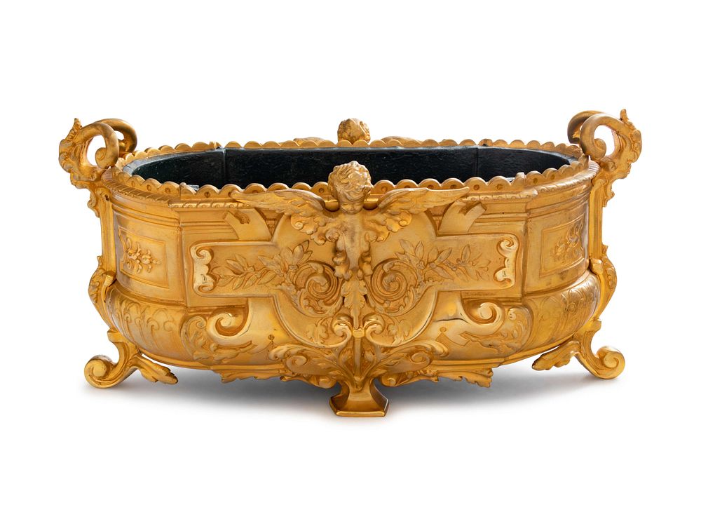 Appraisal: A Neoclassical Gilt Bronze Jardiniere A Neoclassical Gilt Bronze Jardiniere