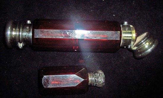 Appraisal: A red glass double ended scent bottle by Howell Co