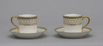 Appraisal: Pair of Limoges Demi-Cups and Saucers Delicate pair of hand