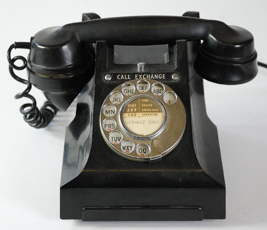 Appraisal: A SERIES BLACK BAKELITE PYRAMID SHAPED TELEPHONE with alphabet and