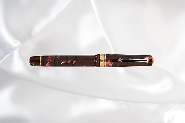 Appraisal: Omas Extra - Red Marbleize Celluloid Collection fountain pen Example