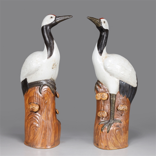 Appraisal: Pair of Chinese porcelain birds each atop tree with fungus