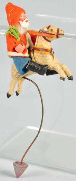 Appraisal: Santa Riding Horse Balancing Toy Description Stamped Germany Composition face