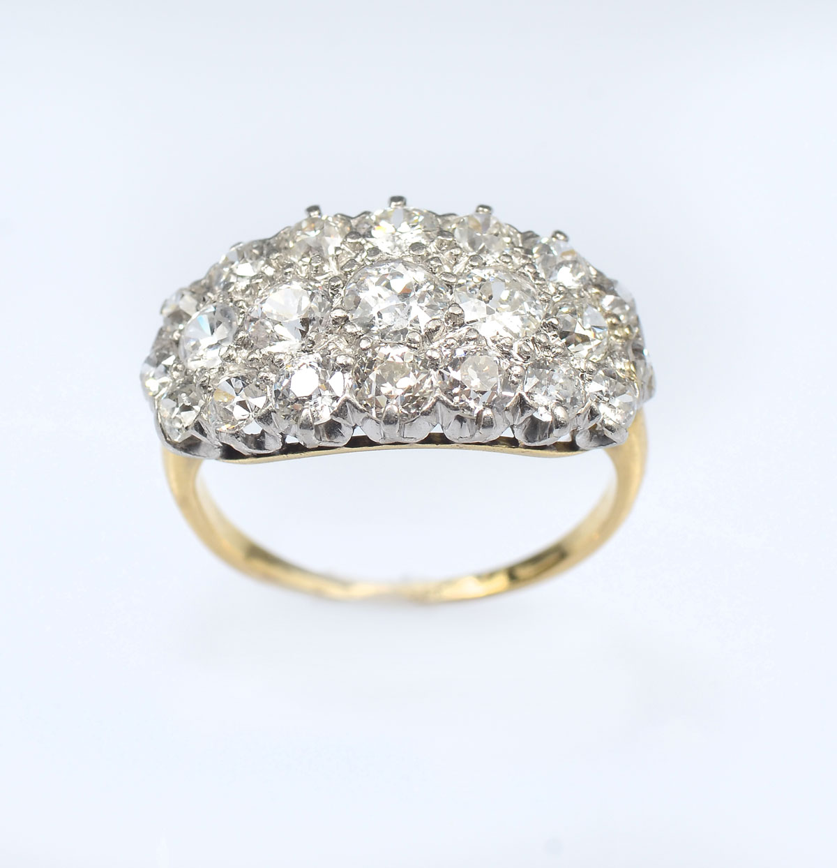 Appraisal: K PLATINUM DOMED DIAMOND RING old European cut diamonds are