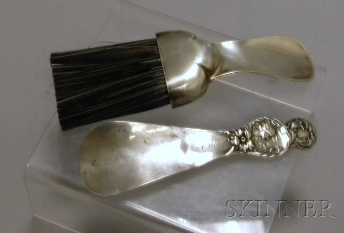 Appraisal: Two Sterling Silver Shoehorns one Art Nouveau and classically decorated