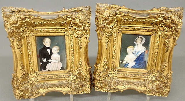 Appraisal: - Pair of miniature oil portraits c a father with