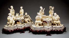 Appraisal: TWO IVORY GROUPS OF IMMORTALS Two large Chinese carved ivory