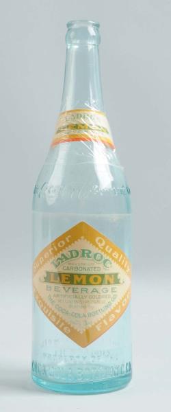 Appraisal: Coca - Cola Bottle With Ladroc Lemon Labels This bottle