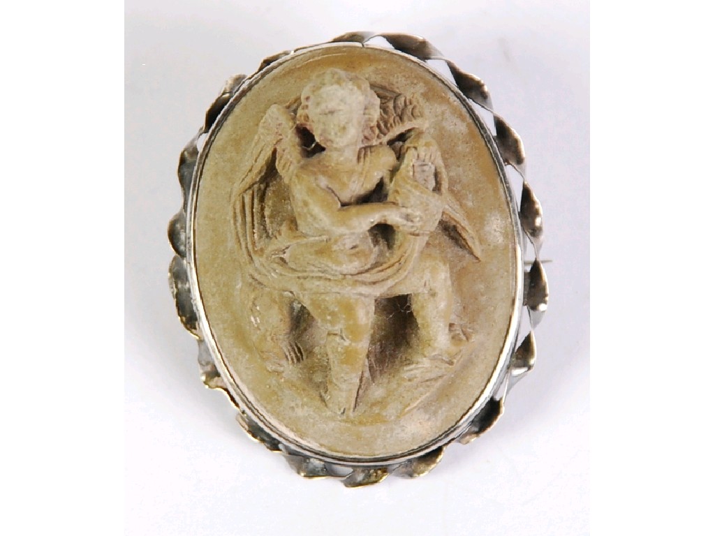 Appraisal: NINETEENTH CENTURY OVAL LAVA CAMEO BROOCH carved in free relief